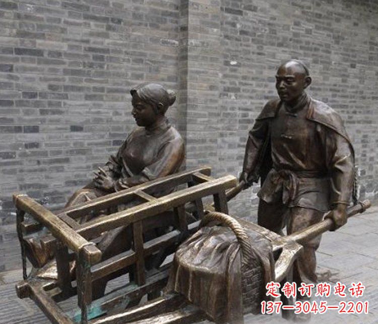 淮安推独轮车的人物铜雕