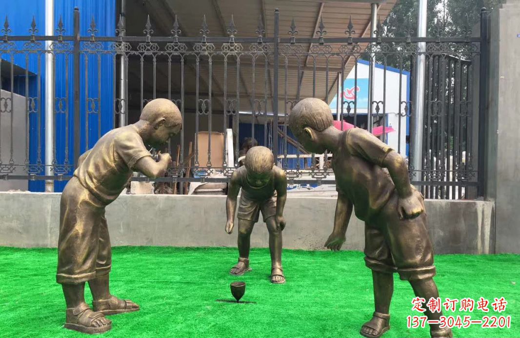 淮安玩陀螺儿童铜雕塑