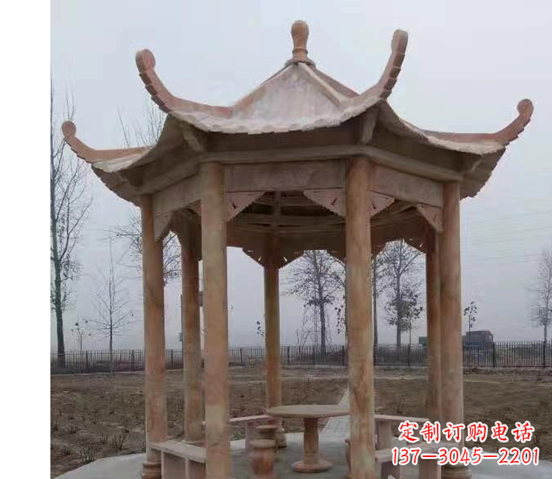 淮安公园晚霞红八角石雕凉亭